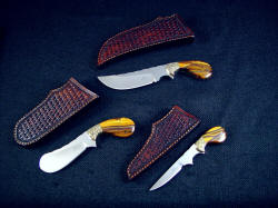 "Trophy Game Set" with matching sheaths in basket weave leather shoulder