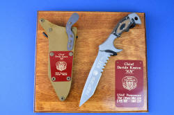 "Uvhash" Pararescue Commemorative, obverse side view with plaque, lighting showing engraving on high chromium martensitic stainless steel blade.