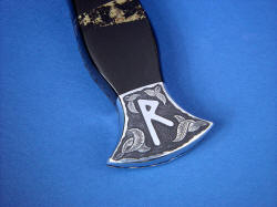 "Vesta" black rune dagger, obverse side rear bolster engraving detail. Many hours are required to hand-engrave in 304 stainless steel