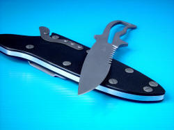 "Viper" skeletonized knife, point detail. Knife point shape is distinctly combat, with a razor-keen edge and good belly