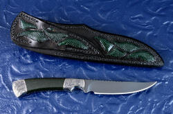 "Wasat" reverse side view with light reflector to show engraving on bolsters in detail, and hollow grind and grind lines. Handle is dark green, almost black