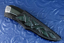 "Wasat" sheathed view. Sheath is deep and protective, with high back for comfortable wear position. Green lizard in black leather matches black jade gemstone handle
