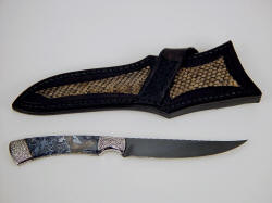 "Wasat" reverse side view. Note nice trailing point on knife blade, Prairie Rattlesnake skin inlays on sheath back