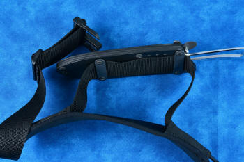 Mounting details of DBAM on belt webbing that is 2" wide. sheath is rigidly clamped to belt, and rides between wide elastic bands that secure the neoprene padding, protecting the body