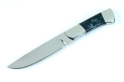 Obverse side view of straight blade of "Zeta" fine handmade custom knife in T3 cryogenically treated ATS-34 high molybdenum stainless steel blade, 304 stainless steel bolsters, Indian Green Moss Agate gemstone handle, hand-carved leather sheath inlaid with green rayskin