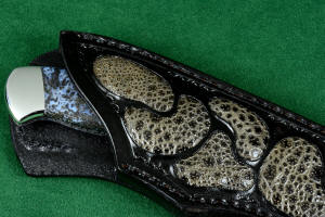 "Zosma" knife sheath mouth detail in T3 deep cryogenically treated 440C high chromium martensitic stainless steel blade, 304 stainless steel bolsters, Texas Moss Agate gemstone handle, sheath in leather shoulder inlaid with frog skin, nylon stitching