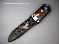 Freedom's Promise, sheathed view, hand carved leather sheath suited to specific knife design and theme