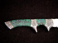 Ruby precious gemston in zoisite matrix on custom tactical art knife handle.