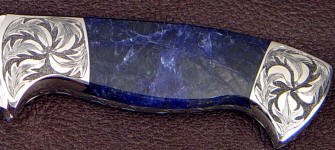 Black Matrix Sodalite gemstone custom knife handle with engraved steel bolsters