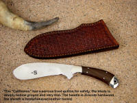 Here's a working cattleman with exotic hardwood handle 