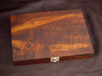 The Trophy Game Set hardwood case in Imbuya exotic wood and brass
