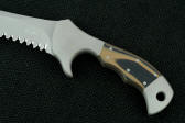 Coyote and black G10 is secured with stainless steel through-tang pins and dovetailed bolsters