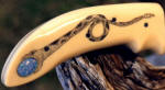 Ivory Micarta® phenolic, scrimshawed and inlaid with opal