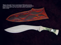 "Maginus-Nasmyth" handmade custom khukri, obverse side view in bead blasted 440C stainless steel blade, nickel silver bolsters, Nephrite Jade gemstone, African Blackwood handle, faux lizard skin inlaid in hand-carved leather sheath