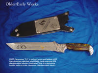 "PJ" USAF Pararescue knife, obverse side view in etched, green gold plated 440C high chromium stainless steel blade, hand-engraved 304 stainless steel bolsters, Australian Tiger Iron gemstone handle, locking kydex, aluminum, stainless steel sheath with etched nickel silver flashplate