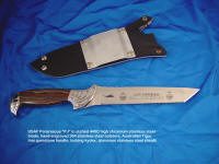 Early Pararescue knife with locking tactical knife sheath
