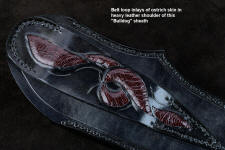 Enlargement, detail of sheath belt loop inlays of ostrich leg skin in leather