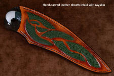 "Conodont" custom knife, obverse side view in 440C high chromium T3 cryogenic treated stainless steel blade, 304 stainless steel bolsters, Indian Green Moss Agate gemstone handle, hand-carved, hand-dyed leather sheath inlaid with rayskin