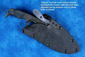 "Kairos" hybrid tension tab-lock sheath with tab unlocked for unsheathing