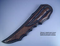 "Khensu" with full lizard skin panel inlays in hand-carved leather sheath, back view