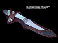 "Little Tusas" obverse side view in 440C high chromium stainless steel blade, hand-engraved low carbon steel bolsters, Biotite gemstone handle, green rayskin inlaid in hand-carved leather sheath