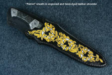 "Patriot" in CPM154CM high molybdenum powder metal technology martensitic stainless steel blade, hand-engraved 304 stainless steel bolsters, Golden Midnight Agate gemstone handle, hand-dyed engraved leather sheath