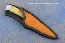 "Phact" in 440C high chromium stainless steel blade, 304 stainless steel bolsters, Fossil Coral gemstone handle, hand-carved leather sheath inlaid with lizard skin
