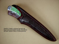 "Shaula" in ATS-34 high molybenum stainless steel blade, hand-engraved 304 stainless steel bolsters, Ruby in Fuchsite gemstone handle, lizard skin inlaid in hand-carved leather shoulder