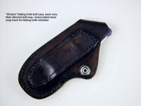 "Stratos" liner lock folding handmade custom knife, sheath back with stitched belt loop in 6-8 oz. leather shoulder