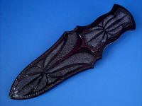 Sheath back for "Vesta" with 32 inlays of black rayskin in black cherry dyed leather