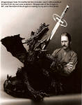 Dragonslayer with artist. This is a large piece, with 400 lbs of cast bronze and a 56" wingspan