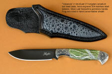 "Vulpecula" obverse side view in hot-blued O1 high carbon tungsten vanadium tool steel alloy, hand-engraved 304 stainless steel bolsters, Silver Leaf Serpentine gemstone handle, Frog skin inlaid in hand-carved leather sheath